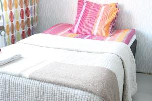 Postel nebo postele na pokoji v ubytování Studio City Borealis