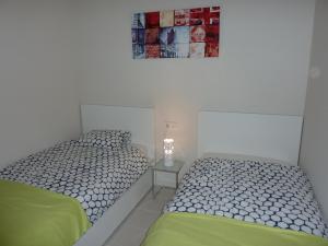 Posteľ alebo postele v izbe v ubytovaní Egeo 3011
