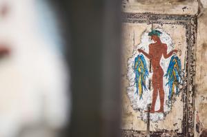 a painting of a woman on a wall at Smaragdi in Perivolos