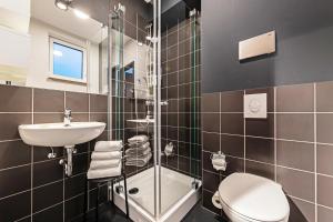 Ett badrum på Hotel Athletik Kiel
