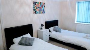 Кровать или кровати в номере Marine Lake apartment