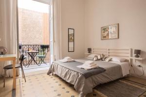 Katil atau katil-katil dalam bilik di La stanza del Vicolo