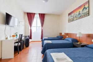 Posteľ alebo postele v izbe v ubytovaní Roma Enrico Guesthouse