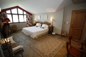 Postel nebo postele na pokoji v ubytování Hotel Katxi