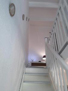 Charmant duplex vue Golf - Marina de St François客房内的一张或多张床位