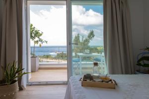 Postel nebo postele na pokoji v ubytování Zabbàra B&B