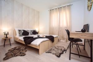 Voodi või voodid majutusasutuse Apartments Bakota toas