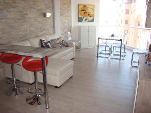 Posezení v ubytování APARTAMENTO GALTOR 10