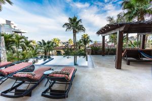 Bazén v ubytování Hacienda Beach Club & Residences nebo v jeho okolí