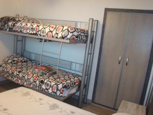 Postel nebo postele na pokoji v ubytování APARTAMENTO GALTOR 10