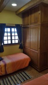 Katil atau katil-katil dalam bilik di Casita Playa La Salemera (Mazo)