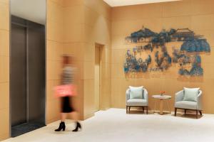 Postel nebo postele na pokoji v ubytování Hyatt Place Beijing Daxing