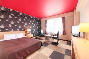 Krevet ili kreveti u jedinici u okviru objekta Quintessa Hotel Iseshima