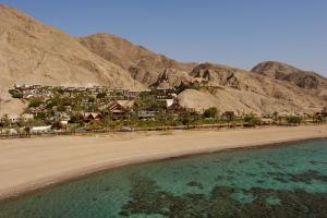 a beach with a large body of water at Orchid Eilat Hotel in Eilat