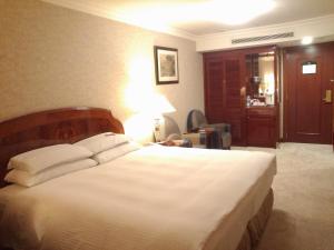 Voodi või voodid majutusasutuse Evergreen Laurel Hotel Taipei toas