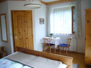 Ένα ή περισσότερα κρεβάτια σε δωμάτιο στο Eichenhof