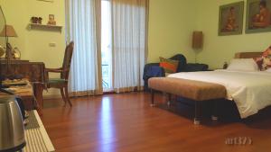 Postel nebo postele na pokoji v ubytování Yi Tian Homestay
