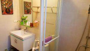 Koupelna v ubytování Yi Tian Homestay