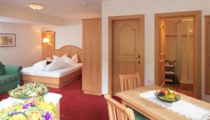 Postel nebo postele na pokoji v ubytování Hotel Augarten