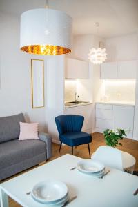 Posedenie v ubytovaní Apartamenty Rakowicka WAWELOFTS