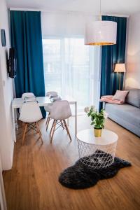 Posteľ alebo postele v izbe v ubytovaní Apartamenty Rakowicka WAWELOFTS