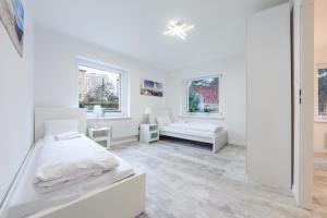 Posteľ alebo postele v izbe v ubytovaní Apartament przy Bulwarze