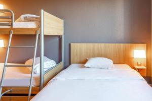 Postel nebo postele na pokoji v ubytování B&B HOTEL Toulon Ollioules