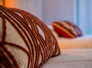 A bed or beds in a room at MALAGA CENTER EXPERIENCE - Premium Apartment