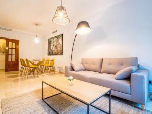 A seating area at MALAGA CENTER EXPERIENCE - Premium Apartment Még 17 kép
