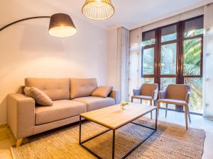 A seating area at MALAGA CENTER EXPERIENCE - Premium Apartment