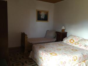 Ένα ή περισσότερα κρεβάτια σε δωμάτιο στο Maison de charme Corse sauvage