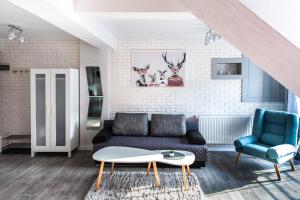 Posezení v ubytování Apartament Łania Frania