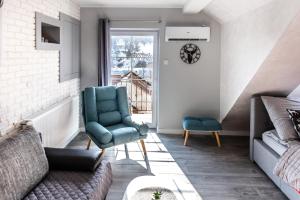 Posezení v ubytování Apartament Łania Frania