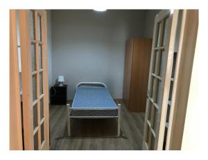 Cama ou camas em um quarto em Covilhã Hostel