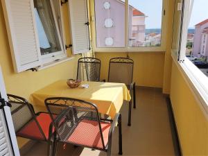 Ein Balkon oder eine Terrasse in der Unterkunft Apartment Blue Sky