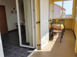 Ein Balkon oder eine Terrasse in der Unterkunft Apartment Blue Sky