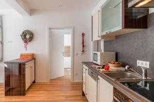 Kuchyňa alebo kuchynka v ubytovaní Appartement - das kleine Bleiberger by Schladmingurlaub