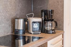 Príslušenstvo na prípravu kávy alebo čaju v ubytovaní Appartement - das kleine Bleiberger by Schladmingurlaub