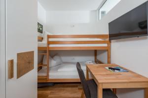 Posteľ alebo postele v izbe v ubytovaní Appartement - das kleine Bleiberger by Schladmingurlaub