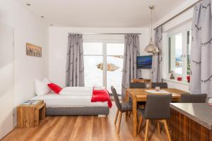 Televízia a/alebo spoločenská miestnosť v ubytovaní Appartement - das kleine Bleiberger by Schladmingurlaub