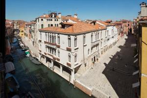 arial view of a city with a river and buildings at Maison Venezia | UNA Esperienze in Venice
