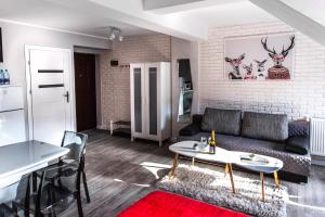 Posedenie v ubytovaní Apartament Łania Frania + 12 fotografií