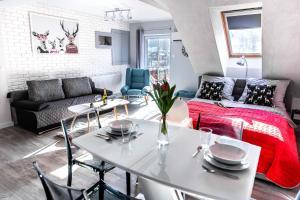 Posezení v ubytování Apartament Łania Frania