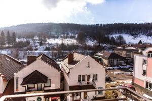 an aerial view of a town in the snow at Apartament Łania Frania in Ustrzyki Dolne