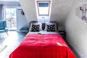 Posteľ alebo postele v izbe v ubytovaní Apartament Łania Frania