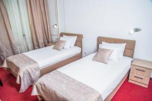Letto o letti in una camera di Hotel N