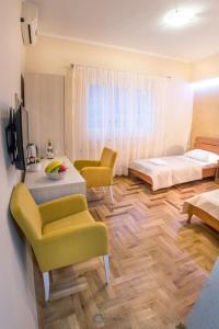 Postel nebo postele na pokoji v ubytování Apartments Vila Marija