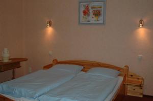 Postel nebo postele na pokoji v ubytování Hotel Kappelner Hof
