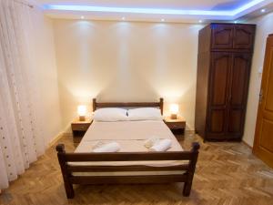 Postel nebo postele na pokoji v ubytování Apartments Vila Marija