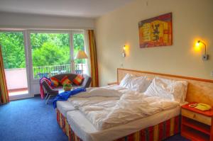 Voodi või voodid majutusasutuse Hotel Excelsior toas